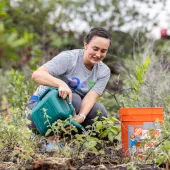 woman watering plant