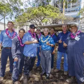 men wearing leis