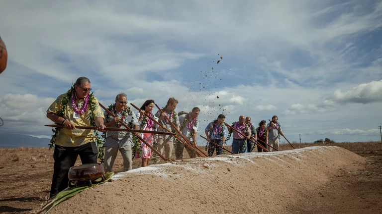 people breaking ground
