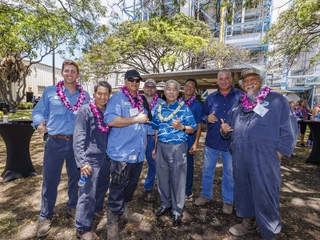 men wearing leis